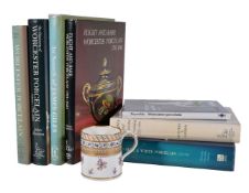 A Worcester (Flight & Barr) mug and seven reference books on Worcester porcelain, the mug circa