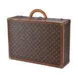 Louis Vuitton, Monogram, a coated canvas and leather hard suitcase, with leather trim, loop handle