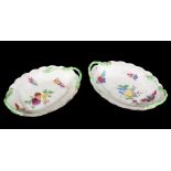 A pair of Worcester shaped oval two-handled 'Blind Earl' trays decorated in the workshop of James