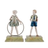 ϒ Ferdinand Preiss (1882-1943), Sonny Boy and Hoop Girl, two Art Deco cold painted bronze and ivory
