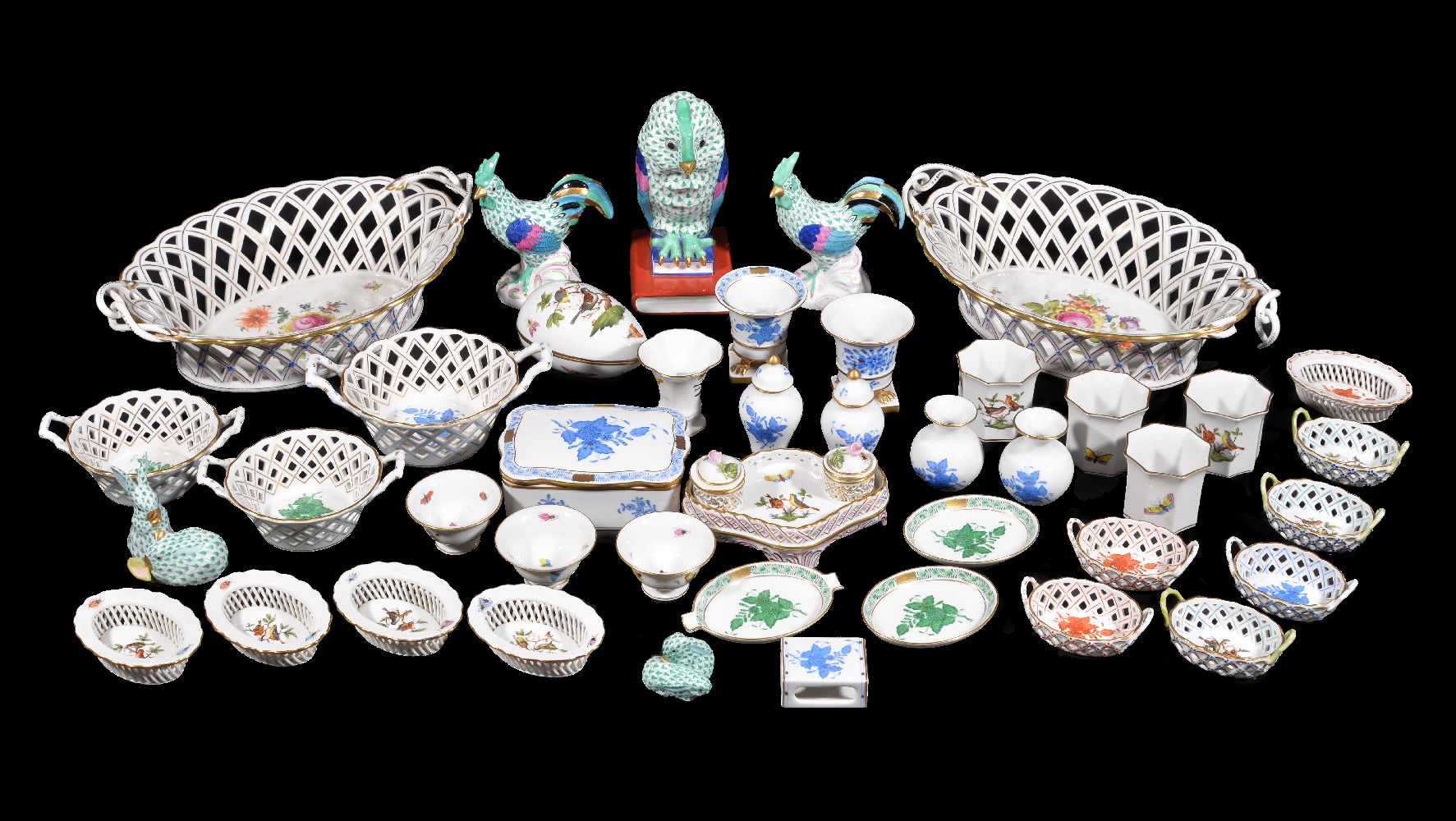 A selection of modern Herend porcelain, including baskets; small vases; an owl bookend; two rabbit