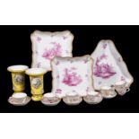 A pair of Meissen (outside decorated) shaped square dishes painted in puce with Watteauesque