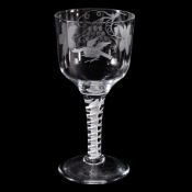 A large engraved opaque-twist wine glass, circa 1760, the generous ogee bowl decorated with a bird