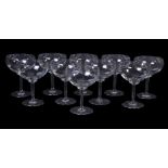 A set of ten modern champagne glasses from the Mirabelle restaurant, Mayfair, each with an acid-