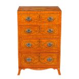 A Sheraton Revival satinwood chest of drawers