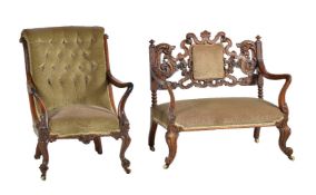 ϒ A Victorian rosewood and upholstered hall or 'love' seat