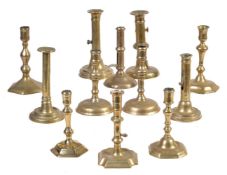 Six various French or English brass candlesticks