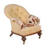 ϒ A Victorian rosewood and button upholstered low chair