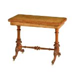 A Victorian walnut card table
