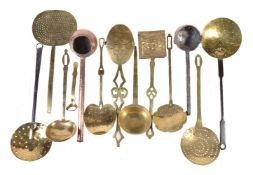 A quantity of brass and copper utensils