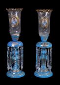 A pair of Czech or Beykoz turquoise blue glass enamelled and gilt table lustres