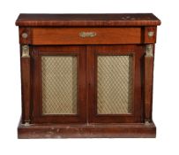 A mahogany and brass mounted side cabinet in Egyptian Revival taste