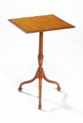 ϒ A George III satinwood and kingwood banded tripod table