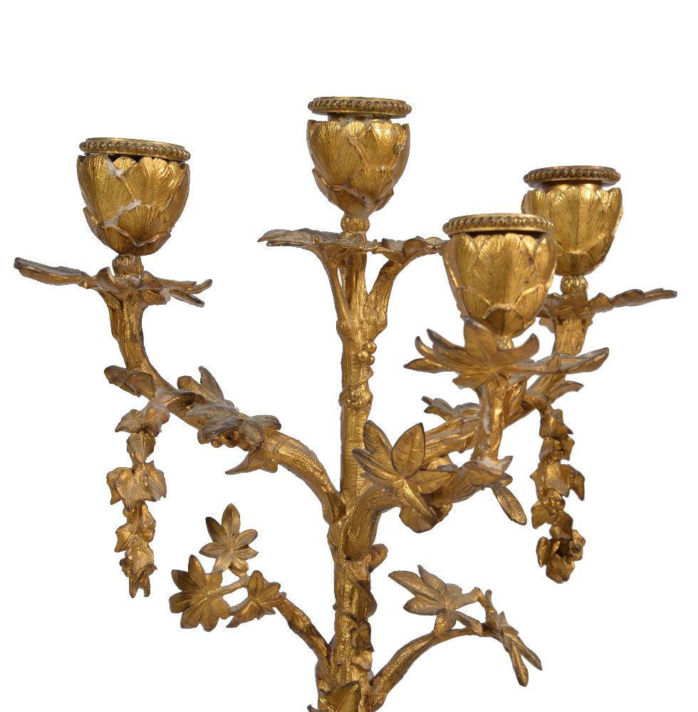 A pair of gilt and patinated metal and white marble mounted four light figural candelabra - Image 4 of 5