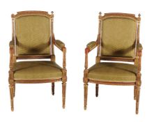 A pair of giltwood and upholstered fauteuils in Louis XVI style