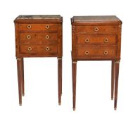 A pair of French burr walnut and marquetry inlaid bedside cabinets