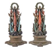 A pair of Victorian painted cast iron door porters modelled as trophies of war