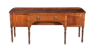 A late George III mahogany, satinwood inlayed and banded sideboard