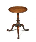 A small tripod table in George III style