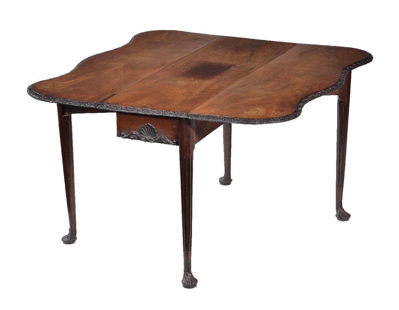 A mahogany drop leaf dining table in George II Irish style