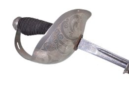 An Elizabeth II 1912 pattern Wilkinson Sword (no. 96580) cavalry sabre with brown leather campaign s