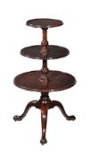 A George III mahogany three tier dumb waiter