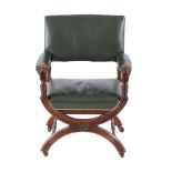 A late Victorian walnut X-frame library chair