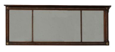 ϒ A rosewood and gilt metal mounted wall mirror in George IV style