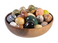 A collection of approximately 32 polished hardstone and marble models of eggs