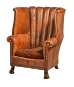 A leather upholstered armchair