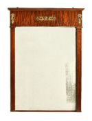 A mahogany and gilt metal mounted wall mirror in Empire taste