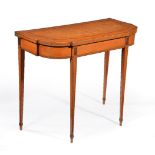 ϒ A George III satinwood, tulipwood banded and line inlaid card table