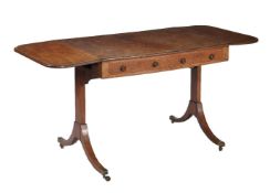 ϒ A Regency mahogany and rosewood banded sofa table