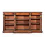 ϒ A rosewood and gilt metal mounted open bookcase in Egyptian Revival taste