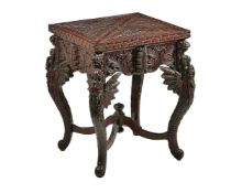 A Chinese carved hardwood envelope card table