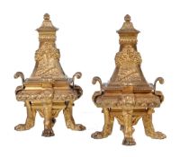 A pair of French gilt bronze chenets in Louis XIV style