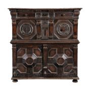 A Charles II two part oak chest of drawers