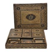 ϒ A Chinese export parcel gilt and black lacquered papier mâché games box