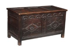 A Charles II panelled oak chest