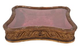 A Victorian carved giltwood, composition and glazed tabletop vitrine in Rococo Revival taste