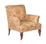 A Victorian walnut and upholstered armchair