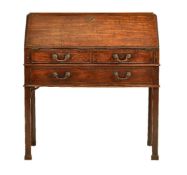 A George II mahogany bureau on stand