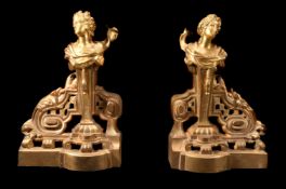 A pair of gilt bronze chenets in late Louis XV style
