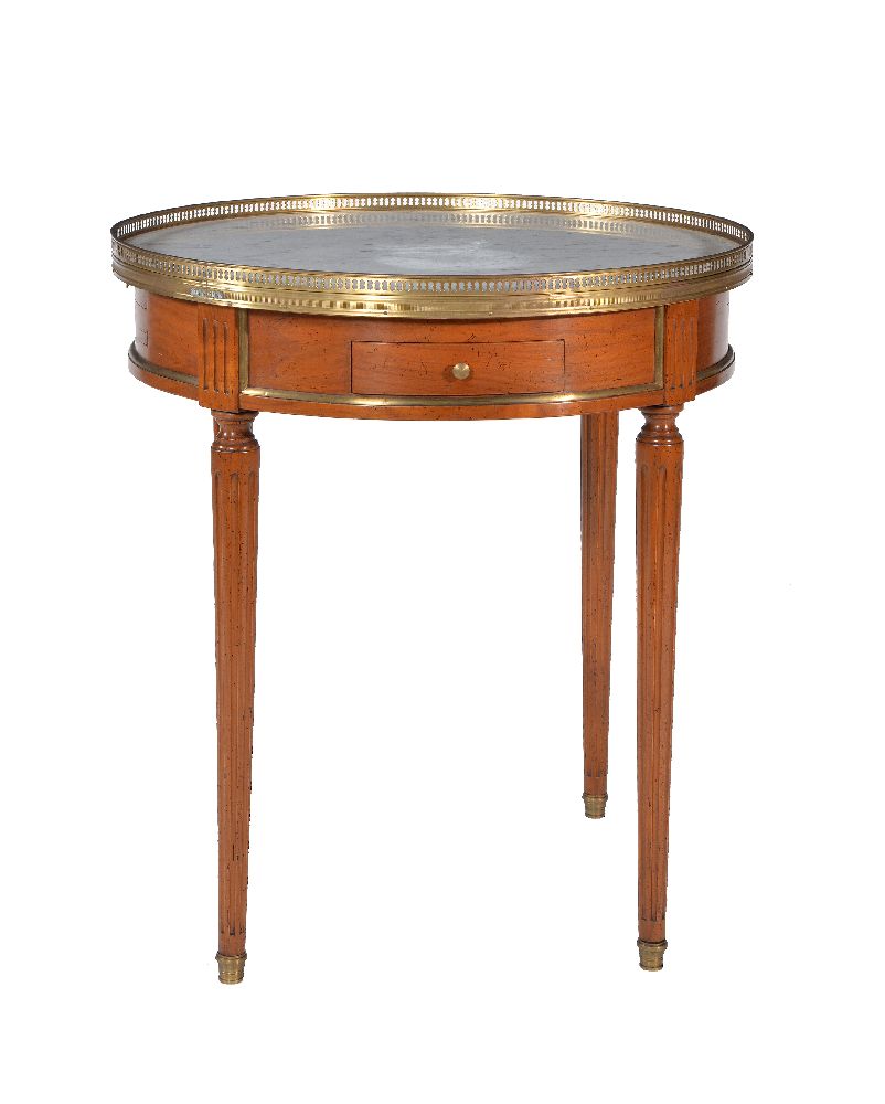 A walnut and marble topped gueridon table