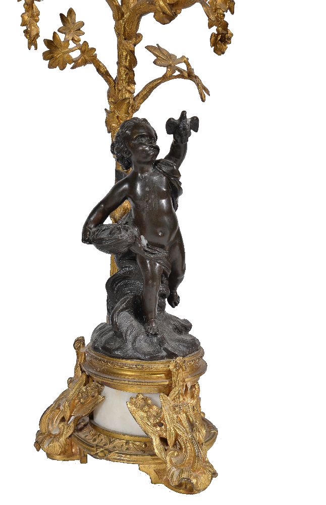 A pair of gilt and patinated metal and white marble mounted four light figural candelabra - Image 3 of 5
