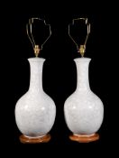 A pair of Japanese celadon glazed table lamps