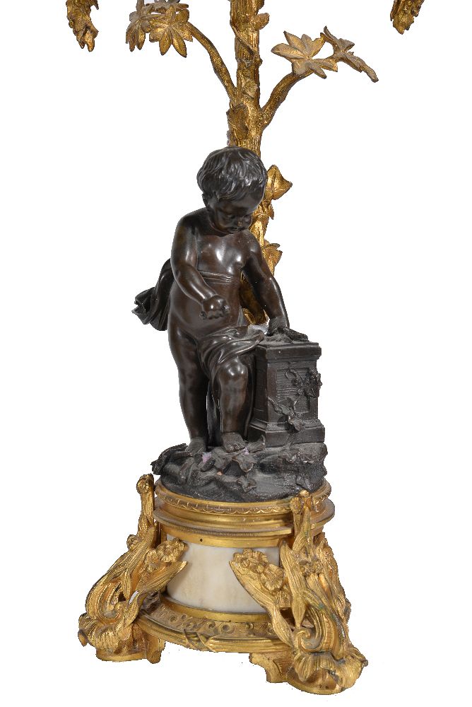 A pair of gilt and patinated metal and white marble mounted four light figural candelabra - Image 2 of 5