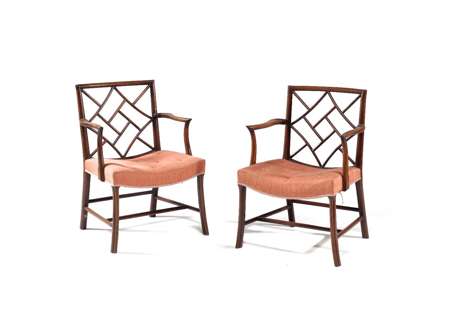 A pair of George III mahogany cock pen armchairs, late 18th century