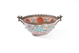 A Japanese gilt-metal mounted Kutani bowl, 19th century