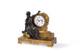 A French Louis XVI patinated bronze and ormolu figural mantel clock, signed 'Louis Montjoye